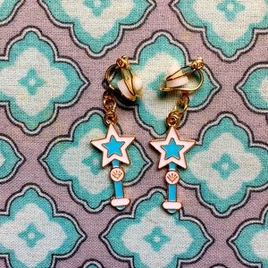 8 pairs of clip on earrings/have never been worn